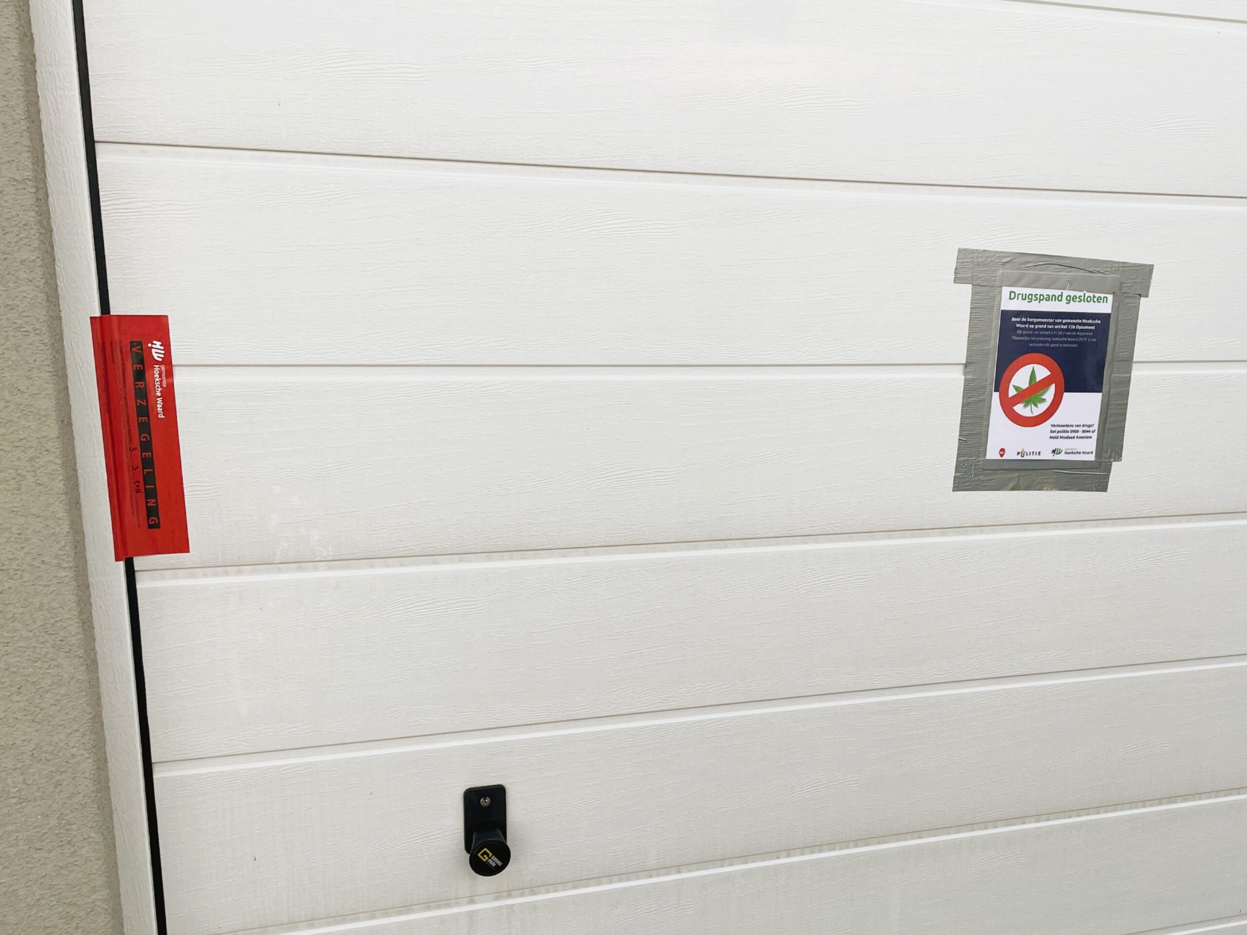 Burgemeester Witte sluit garagebox op Garagepark Heinenoord na vondst materialen hennepkwekerijen